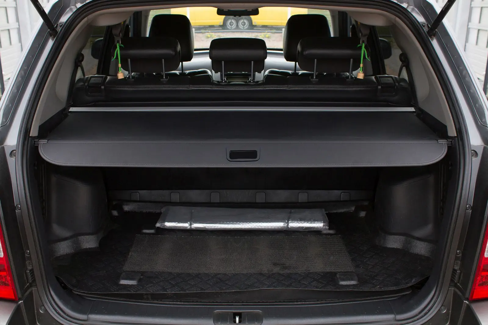 Bagasjerom rollon Hyundai Tucson I 2004 - 2010 │ Uttrekkbart bagasjeromstrekk