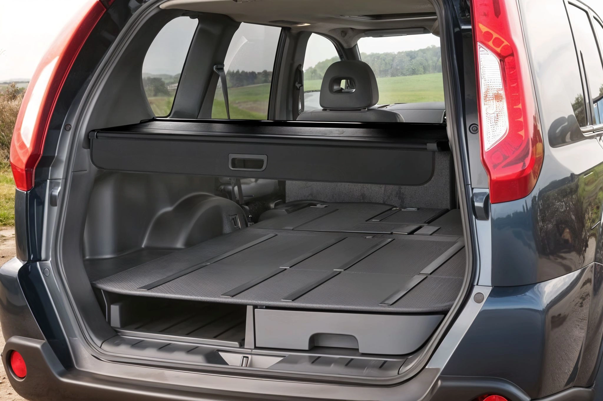 Bagasjerom rollon Nissan X-Trail II 2007 - 2013 │ Uttrekkbart bagasjeromstrekk